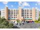 Three-story building with parking and landscaping at 6450 Shoreline Dr # 9105, St Petersburg, FL 33708