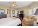 Spacious bedroom with a comfy sitting area and plenty of natural light at 6450 Shoreline Dr # 9105, St Petersburg, FL 33708