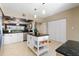 Well-equipped kitchen with ample storage and an island at 6450 Shoreline Dr # 9105, St Petersburg, FL 33708