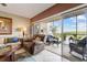 Living room with access to a screened-in balcony at 6450 Shoreline Dr # 9105, St Petersburg, FL 33708