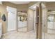 Bright bathroom with a shower and mirrored closet doors at 6450 Shoreline Dr # 9105, St Petersburg, FL 33708