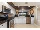 Modern kitchen with stainless steel appliances and granite countertops at 6450 Shoreline Dr # 9105, St Petersburg, FL 33708