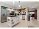 Updated kitchen featuring a kitchen island and white cabinets at 6450 Shoreline Dr # 9105, St Petersburg, FL 33708