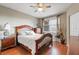 Charming bedroom with wood flooring and a ceiling fan at 6450 Shoreline Dr # 9105, St Petersburg, FL 33708