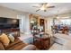 Bright living room featuring a large TV and ample seating at 6450 Shoreline Dr # 9105, St Petersburg, FL 33708