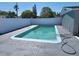 Inviting rectangular pool in a fenced backyard at 12800 Vassar Ct, Hudson, FL 34667