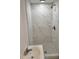 Clean bathroom with marble shower and pedestal sink at 12800 Vassar Ct, Hudson, FL 34667