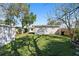 Large backyard with grassy area and detached storage building at 4300 16Th N Ave, St Petersburg, FL 33713