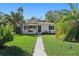 Charming ranch house with a well-manicured lawn at 4300 16Th N Ave, St Petersburg, FL 33713