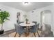 Charming dining room with a round table and four gray chairs at 701 17Th S Ave, St Petersburg, FL 33701