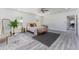 Spacious primary bedroom, featuring hardwood floors and a ceiling fan at 701 17Th S Ave, St Petersburg, FL 33701