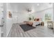 Large main bedroom with hardwood floors and a ceiling fan at 701 17Th S Ave, St Petersburg, FL 33701