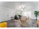 Bright living room with hardwood floors, comfy seating, and large windows at 701 17Th S Ave, St Petersburg, FL 33701
