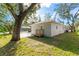 Rear view of house, showing patio and side yard at 701 17Th S Ave, St Petersburg, FL 33701