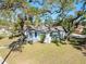 Aerial view of a charming house with a well-manicured lawn at 701 17Th S Ave, St Petersburg, FL 33701