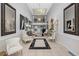 Elegant lobby with seating area and high ceilings at 8 Belleview Blvd # 203, Belleair, FL 33756