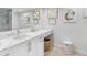 Elegant bathroom with a quartz countertop and a walk-in shower at 8 Belleview Blvd # 203, Belleair, FL 33756