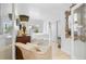 Serene bedroom with a sitting area and access to a private balcony at 8 Belleview Blvd # 203, Belleair, FL 33756