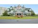 Charming Belleview Inn exterior with wrap-around porch at 8 Belleview Blvd # 203, Belleair, FL 33756