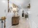 Charming hallway with decorative accents and access to other rooms at 8 Belleview Blvd # 203, Belleair, FL 33756