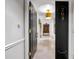 Inviting entryway with dark wood door and light flooring at 8 Belleview Blvd # 203, Belleair, FL 33756