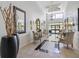 Bright lobby with upscale furnishings and mirrors at 8 Belleview Blvd # 203, Belleair, FL 33756