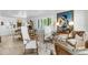 Elegantly furnished living room with a large piece of art at 8 Belleview Blvd # 203, Belleair, FL 33756
