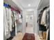 Large walk-in closet with ample hanging space and shelving at 8 Belleview Blvd # 203, Belleair, FL 33756