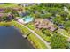 Community features a clubhouse, pool, and lake at 9650 Lake Chase Island Way # 9650, Tampa, FL 33626