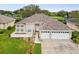 Image 1 of 55: 1054 Sawgrass Dr, Tarpon Springs