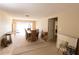 Spacious living room with large window and neutral decor at 12210 Buttonwood Row, Hudson, FL 34667