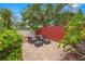 Charming paved patio with stylish outdoor seating, perfect for relaxing or entertaining guests at 30735 Lanesborough Cir, Wesley Chapel, FL 33543
