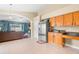 Kitchen features stainless steel appliances and wood cabinets at 30735 Lanesborough Cir, Wesley Chapel, FL 33543