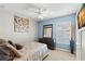 Comfortable bedroom with a queen-size bed and plenty of natural light at 30735 Lanesborough Cir, Wesley Chapel, FL 33543