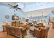 Relaxing community room with comfortable seating and large screen TV at 30735 Lanesborough Cir, Wesley Chapel, FL 33543