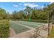 Shuffleboard courts with benches and hedges at 30735 Lanesborough Cir, Wesley Chapel, FL 33543