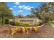 Ammanford community entrance with landscaping at 30735 Lanesborough Cir, Wesley Chapel, FL 33543