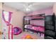 bedroom with a bunk bed and colorful decor at 30735 Lanesborough Cir, Wesley Chapel, FL 33543
