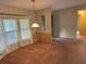 Simple dining room with carpeted floor and window at 34303 Lodge Dr, Wesley Chapel, FL 33543