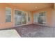 Covered patio with sliding glass doors opening to the interior at 18051 Java Isle Dr, Tampa, FL 33647