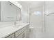 Clean bathroom with a shower/tub combo and vanity at 18051 Java Isle Dr, Tampa, FL 33647