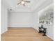 Bright bedroom with light wood flooring and large window at 18051 Java Isle Dr, Tampa, FL 33647
