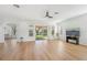 Open living area with access to patio and kitchen at 18051 Java Isle Dr, Tampa, FL 33647
