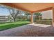 Covered patio overlooks a pond, offering a relaxing outdoor space at 18051 Java Isle Dr, Tampa, FL 33647