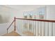 View from the staircase overlooking the main floor at 18051 Java Isle Dr, Tampa, FL 33647