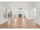 Open concept living area with patio access and kitchen view at 18051 Java Isle Dr, Tampa, FL 33647