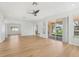 Bright and airy living room with hardwood floors and lots of natural light at 18051 Java Isle Dr, Tampa, FL 33647