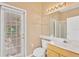 Clean bathroom with single sink vanity and shower at 16315 Sambourne Ln, Tampa, FL 33647