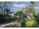 Mature trees and garden path at 2406 S Clark Ave, Tampa, FL 33629