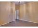 Small bedroom with closet and access to another room at 2406 S Clark Ave, Tampa, FL 33629